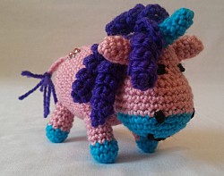 Kuscheltier - Einhorn - Pink / Blau / Lila mit Locken und Paillette