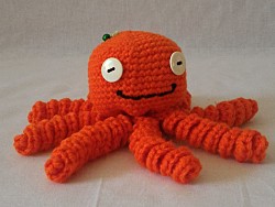 Kuscheltier - Krake - Orange mit Schillerlocken, Knöpfe und Perlen